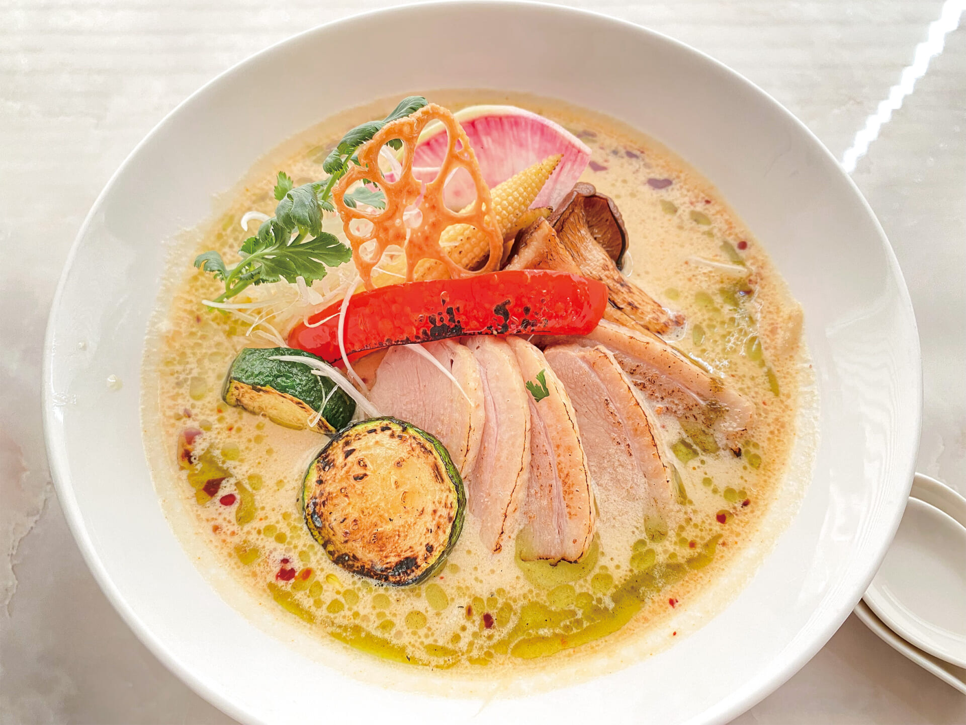 【深川店5月限定】
合鴨ローストと彩り焼き野菜の豆乳担々麺 写真